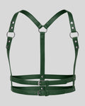 green leather harness with silver buckles and rivets laid flat