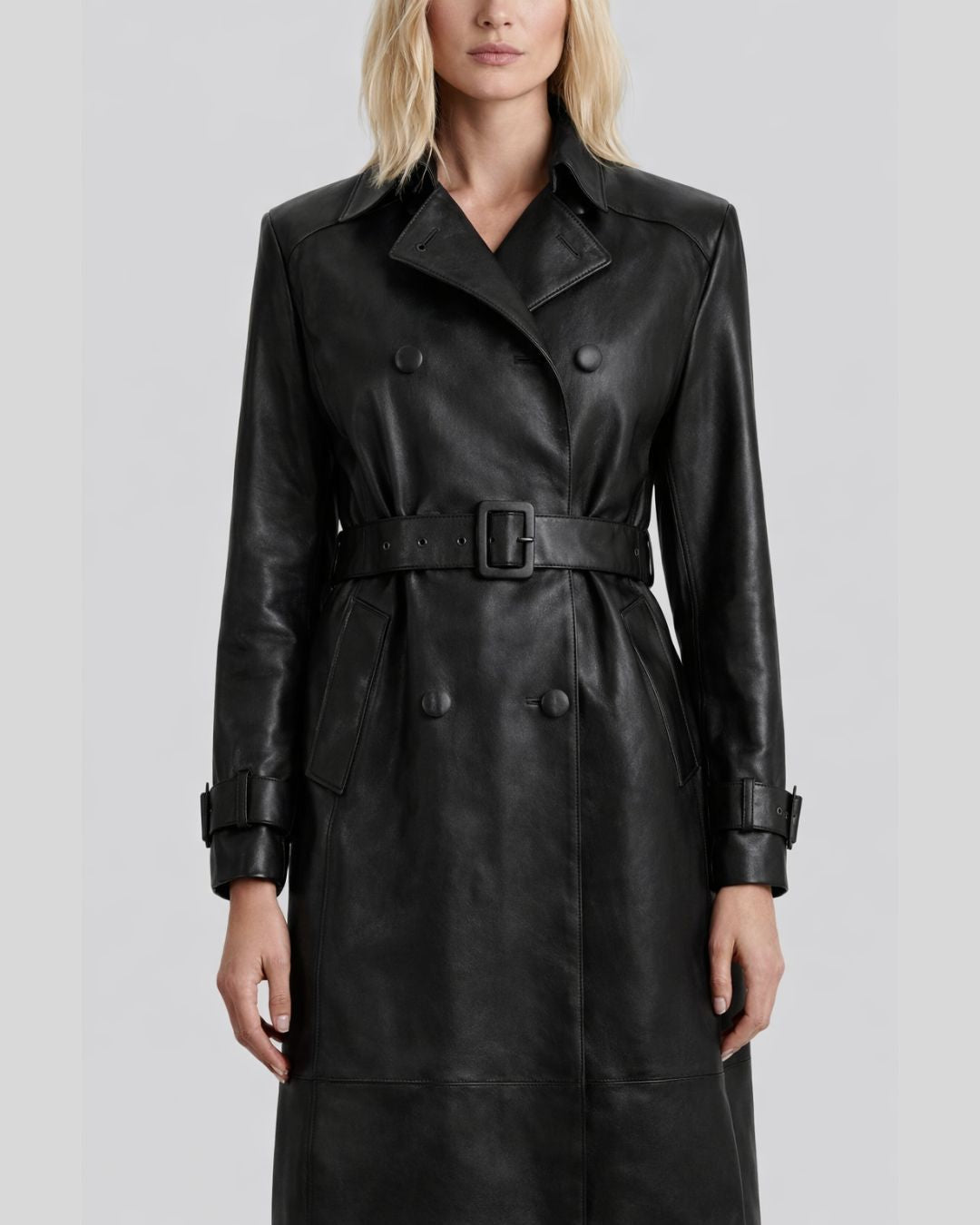 Close-up front of belted black leather trench coat for women