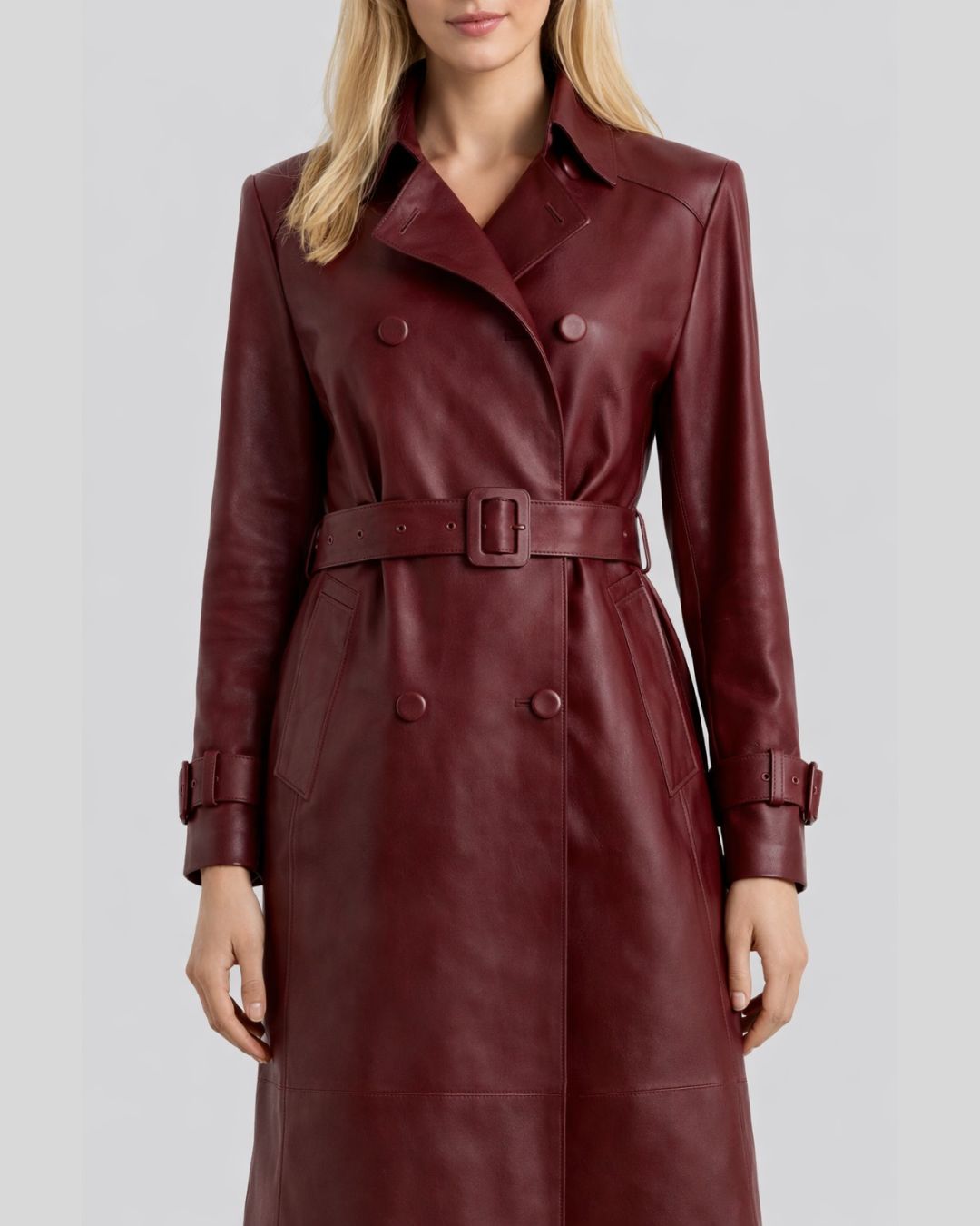close up of burgundy leather trench coat belt and buttons