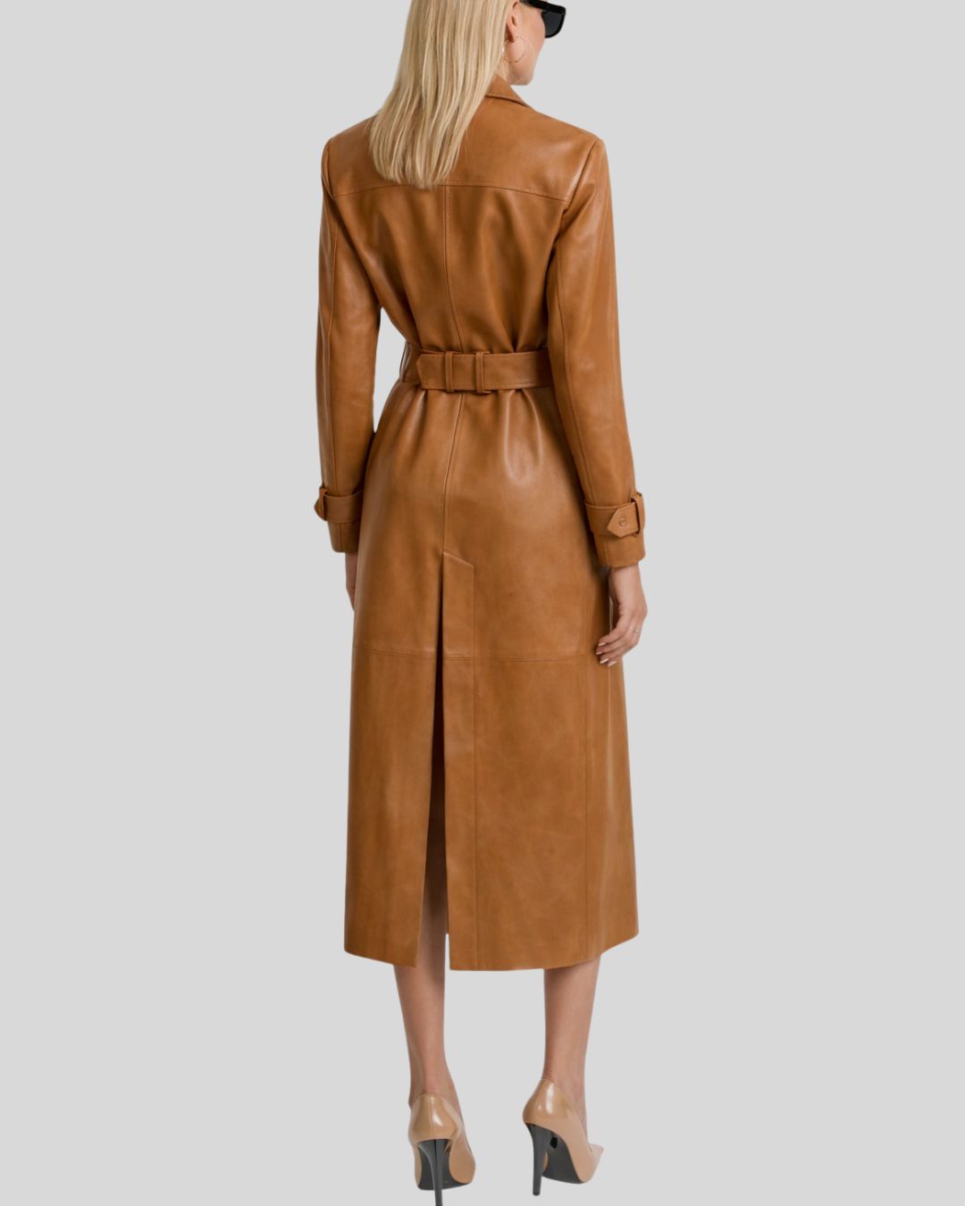 Back view of belted caramel leather trench coat