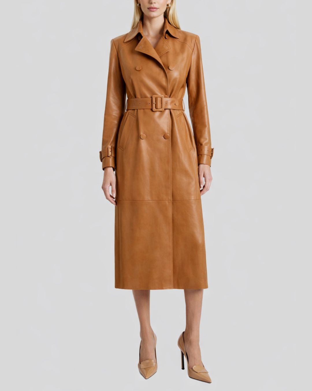 Front view of belted caramel leather trench coat women