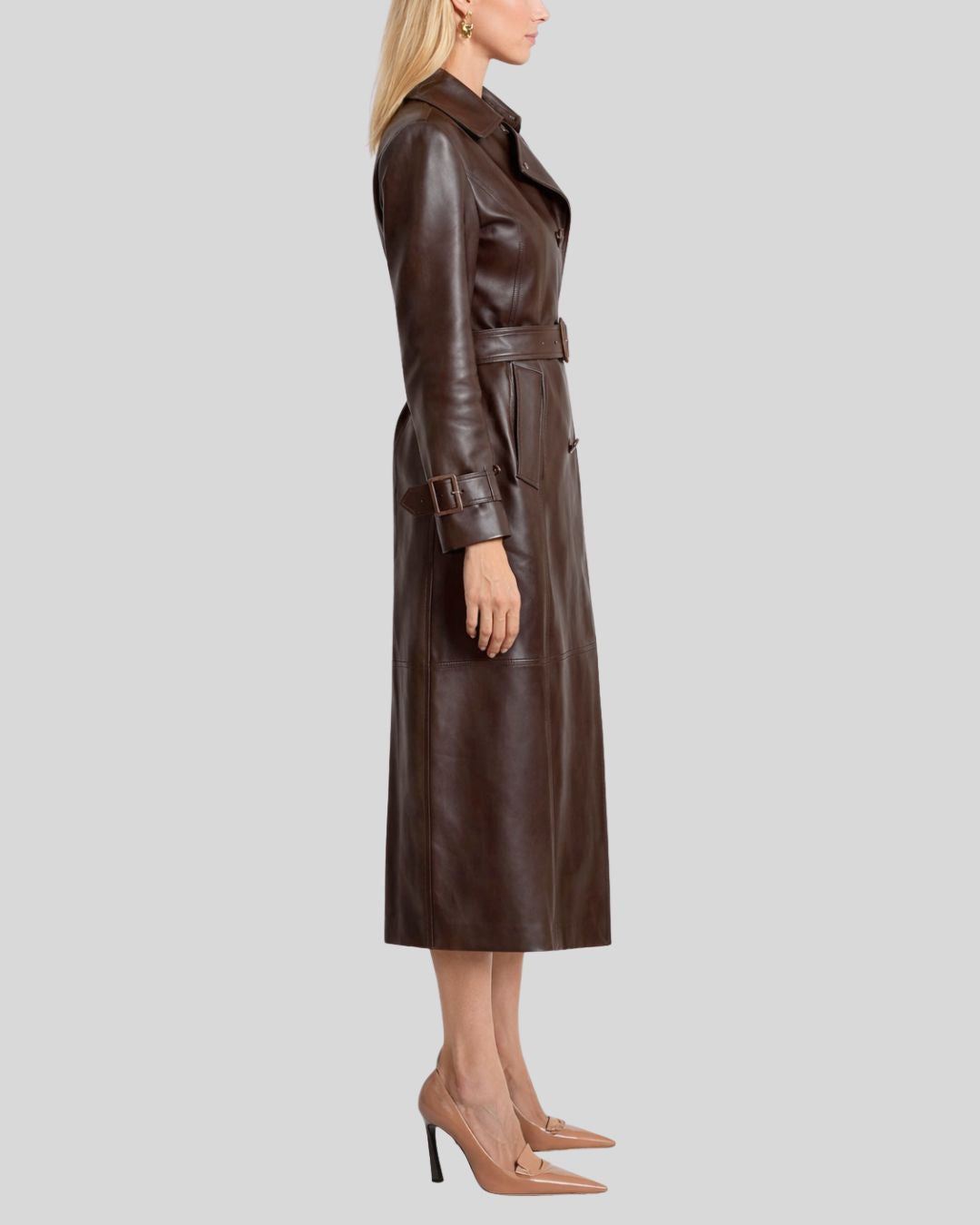 Side view of belted dark brown leather trench coat women