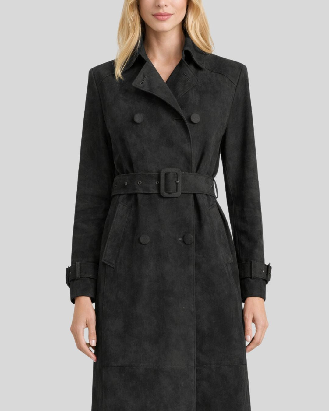 Close-up front view of women’s black suede trench coat with belt detail