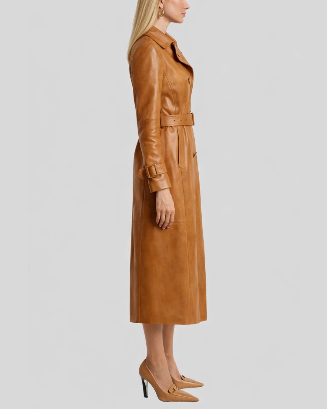 Front view of belted caramel leather trench coat women