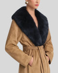 Close-up of faux fur collar on tan suede coat