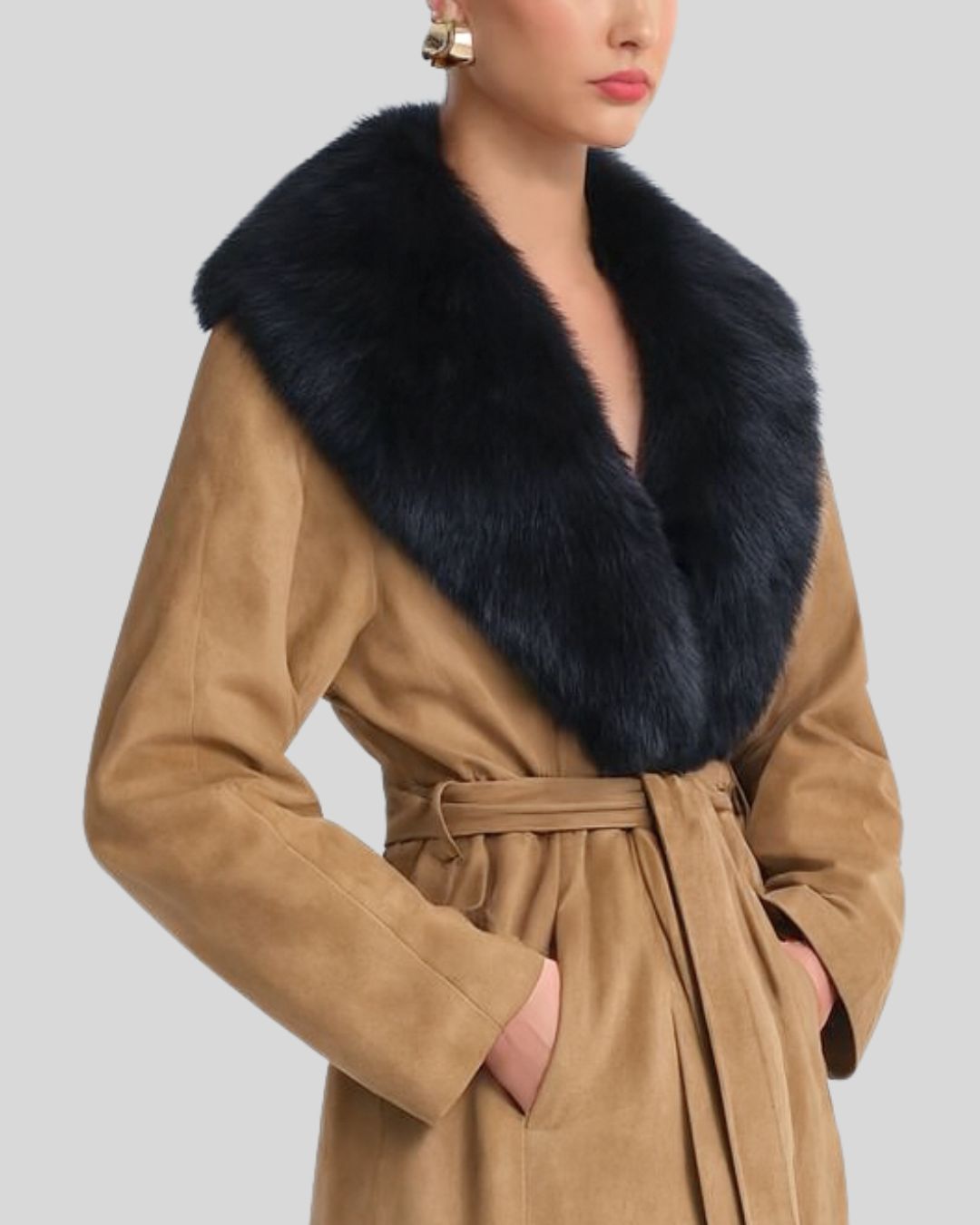 Close-up of faux fur collar on tan suede coat