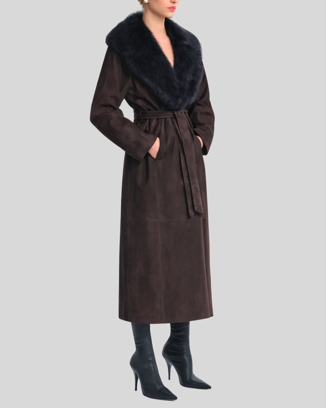 Woman wearing mocha brown suede fur collar coat with belted waist