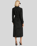 Back view of long black suede trench coat for women showing tailored seams