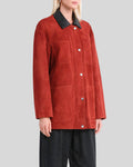 Side angle of red button up suede jacket women