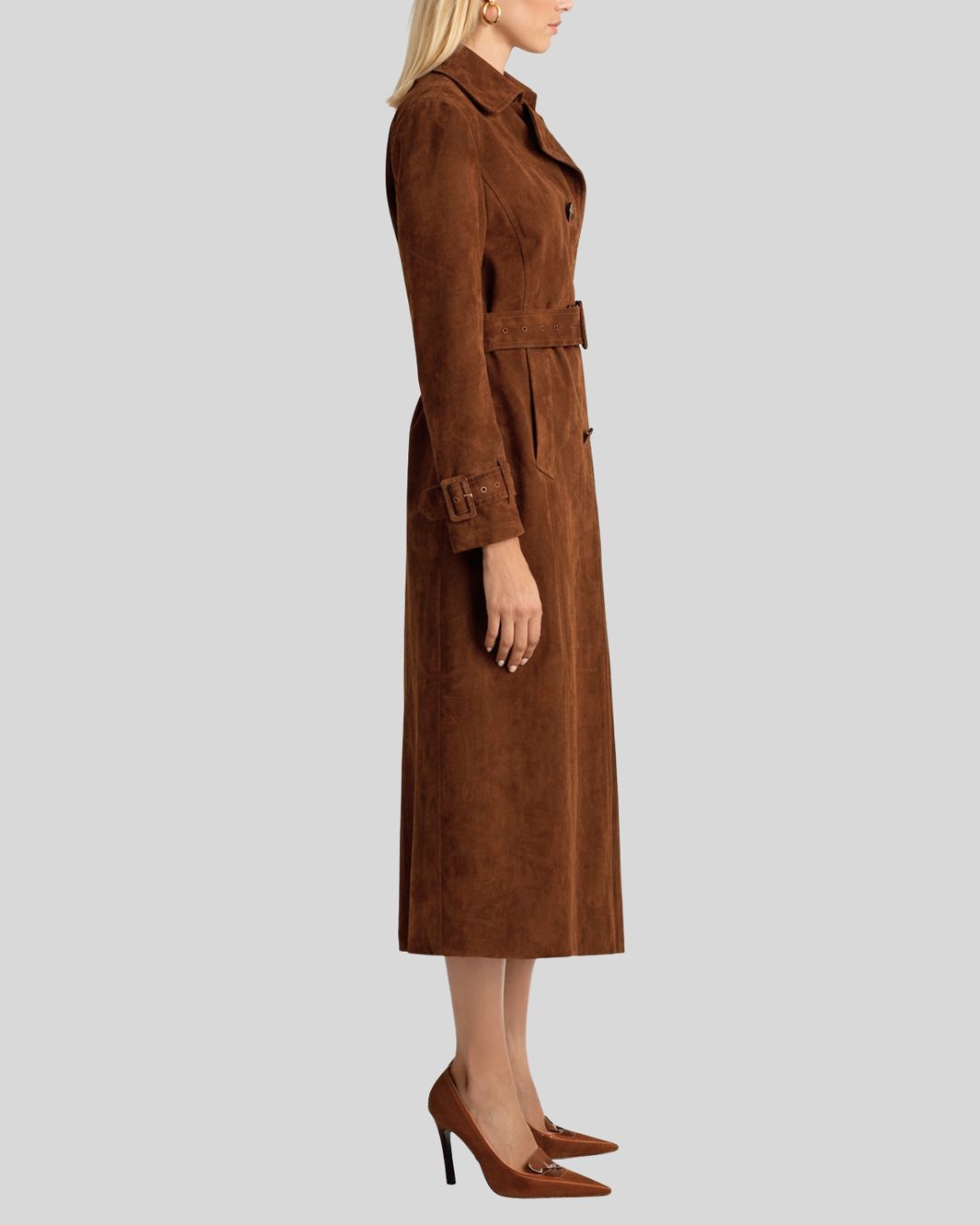 Front view of brown suede trench coat for women with double breasted design and belt