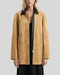 Front view of tan button up suede jacket women