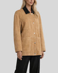 Side angle of tan button up suede jacket women