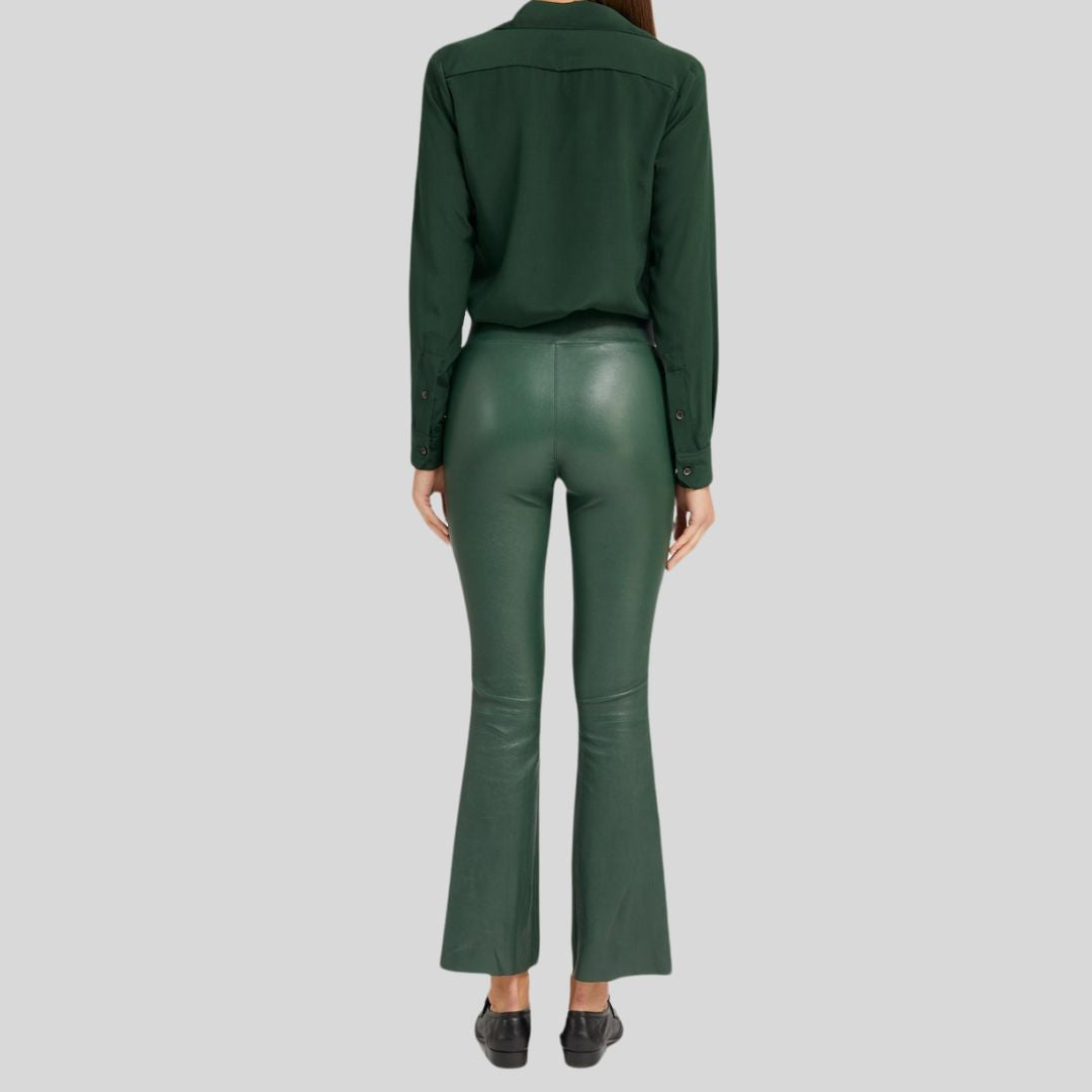 front view of women's green leather pants with flare