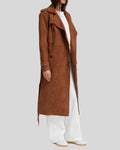  Side view of brown suede trench coat with belted cuffs
