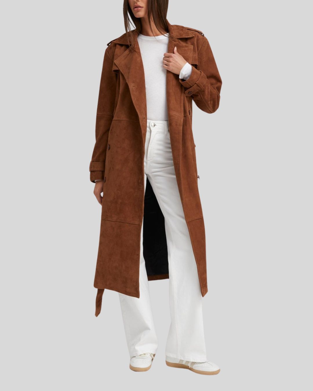  Woman in long chocolate brown suede trench coat open at front
