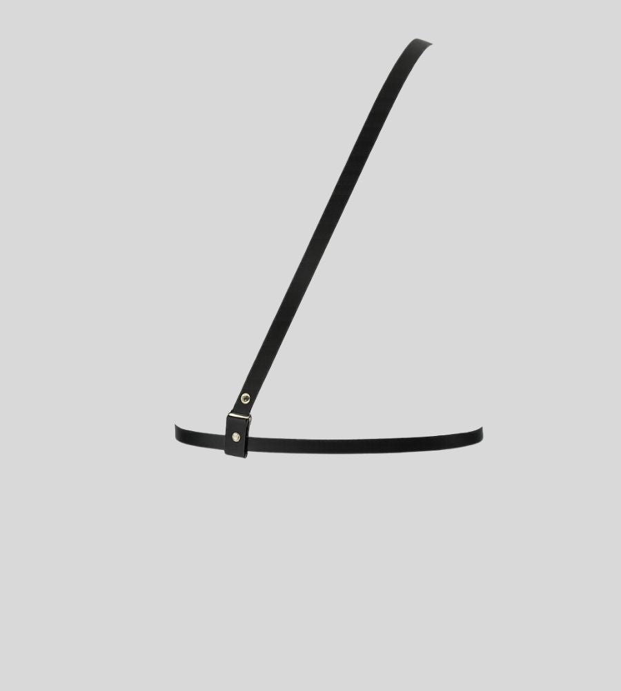 back profile of black leather chest harness with buckle detail