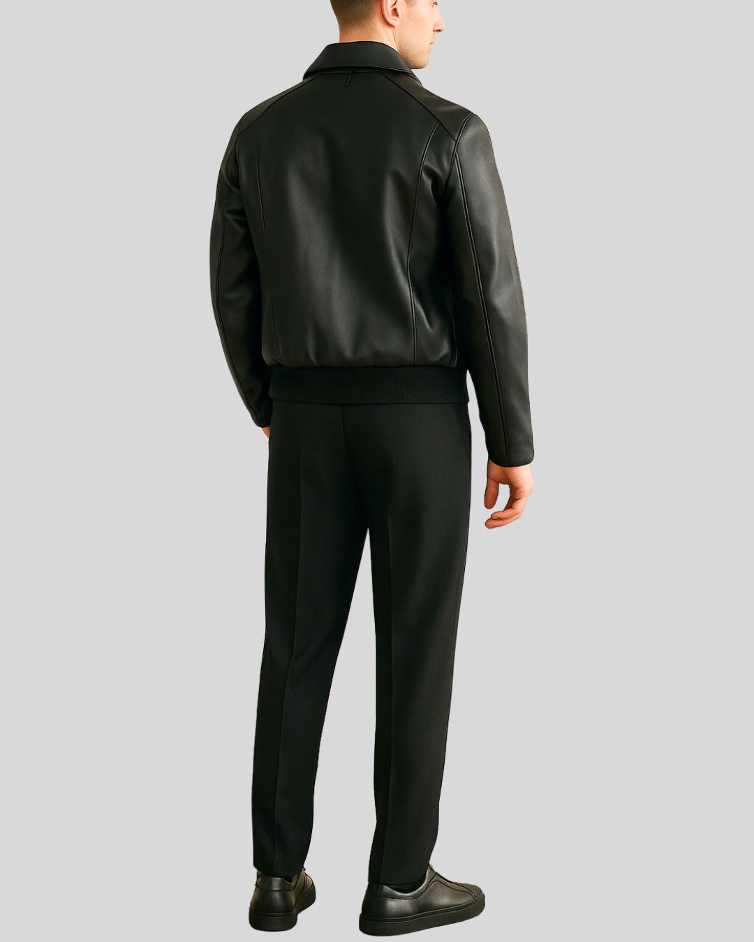 Front close-up of black leather utility bomber jacket for men