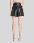 Back view of black high waisted leather shorts women