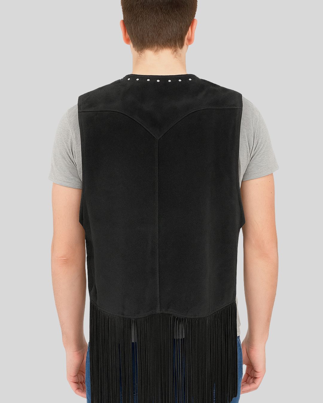 Rear view of black suede fringe vest showing yoke design and back fringe