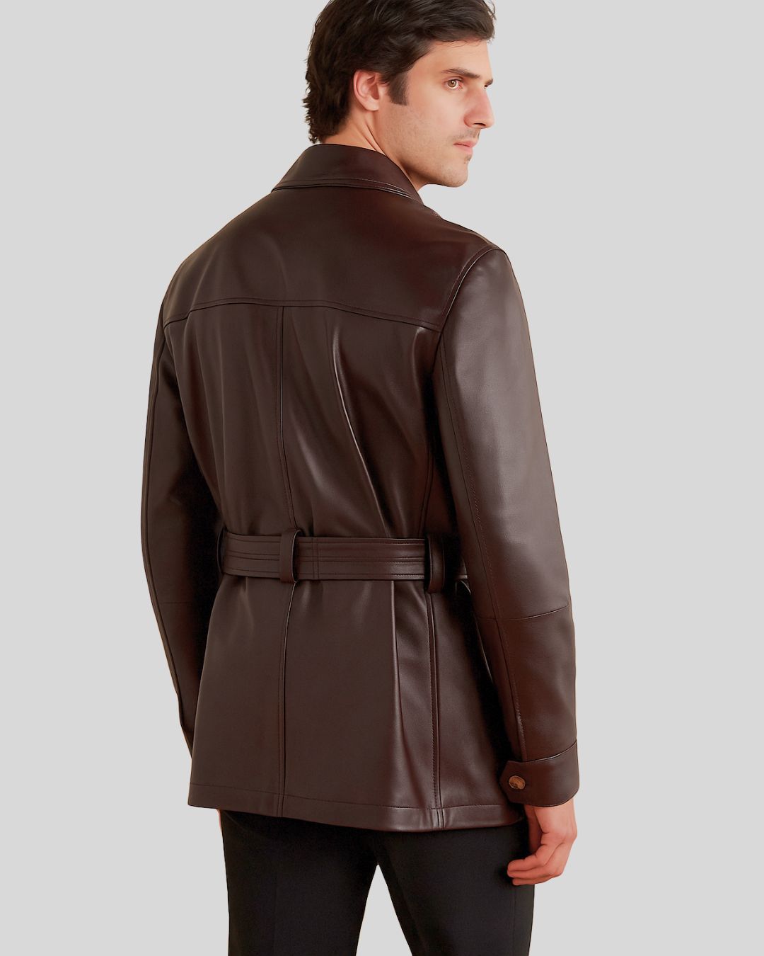 Rear view of dark brown safari-style leather coat for men