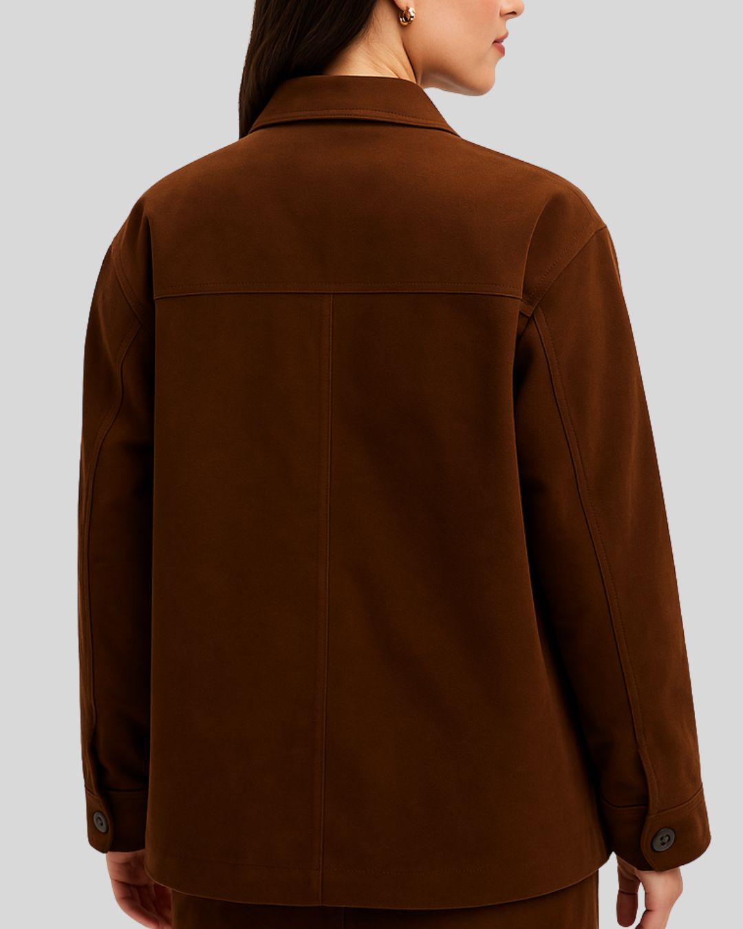 Back view of a women's dark brown suede field jacket with buttoned cuffs
