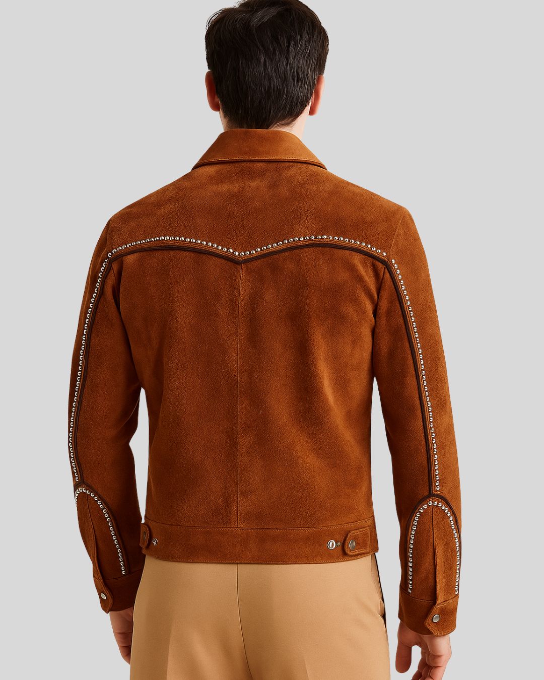 Front view of men’s rust suede jacket with pearl and silver stud embellishments