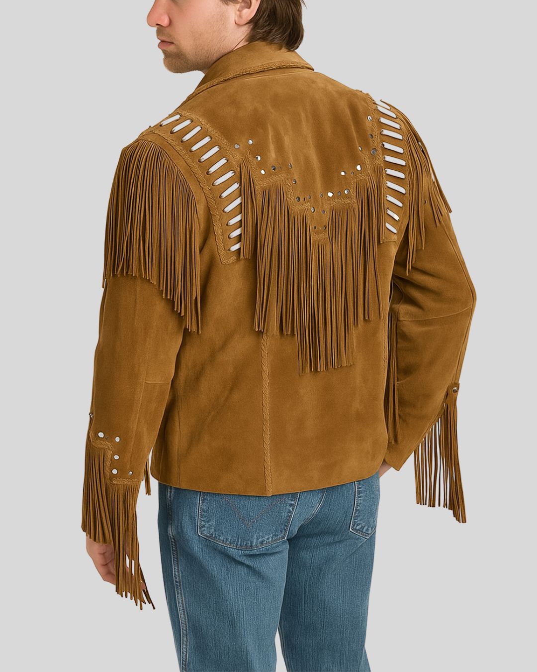 Man wearing tan suede western fringe jacket with bone bead trim