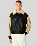 Front view of beige shearling collar leather jacket with contrast sleeves