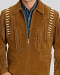 Close-up of front fringe and bead detail on tan suede jacket