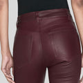 bordeaux luxe leather flare pants burgundy genuine leather back leather gates back close pic with model