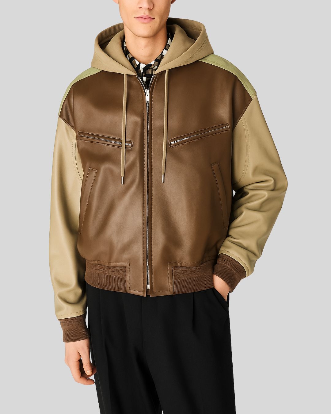 Front view of men's two-tone leather bomber jacket with hood