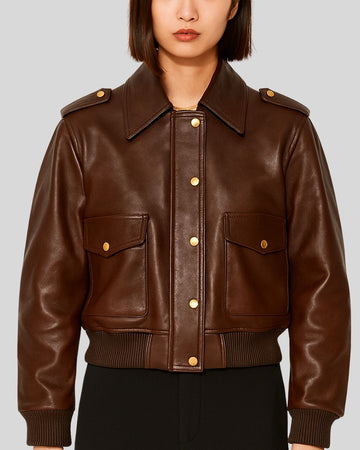 Brown leather bomber jacket for women with gold snap buttons – front view