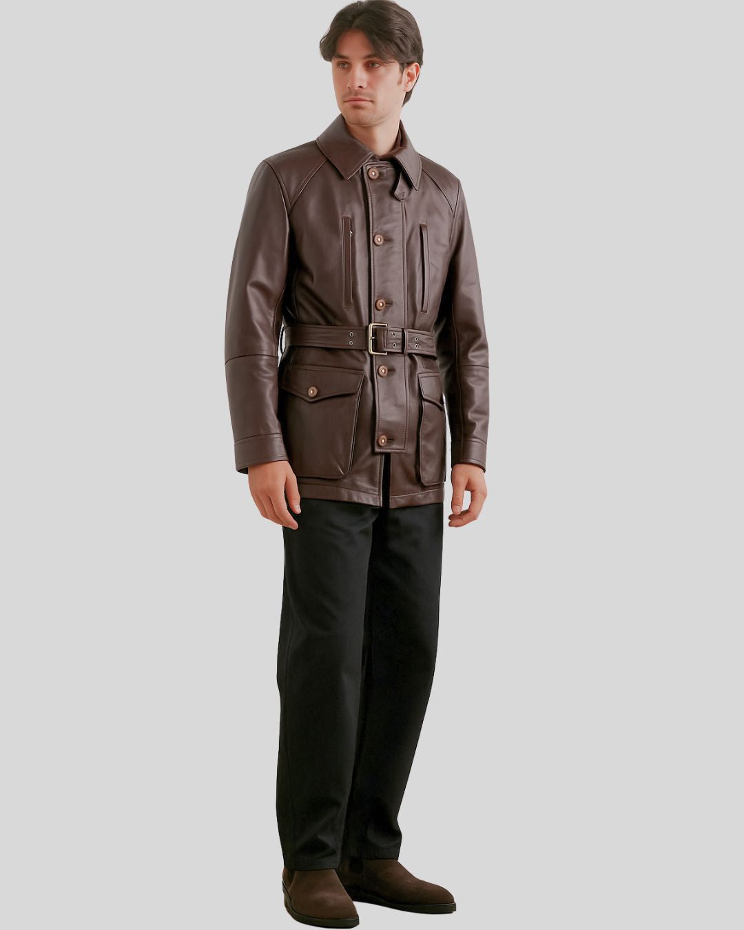 Man wearing brown leather safari jacket with belt – front view