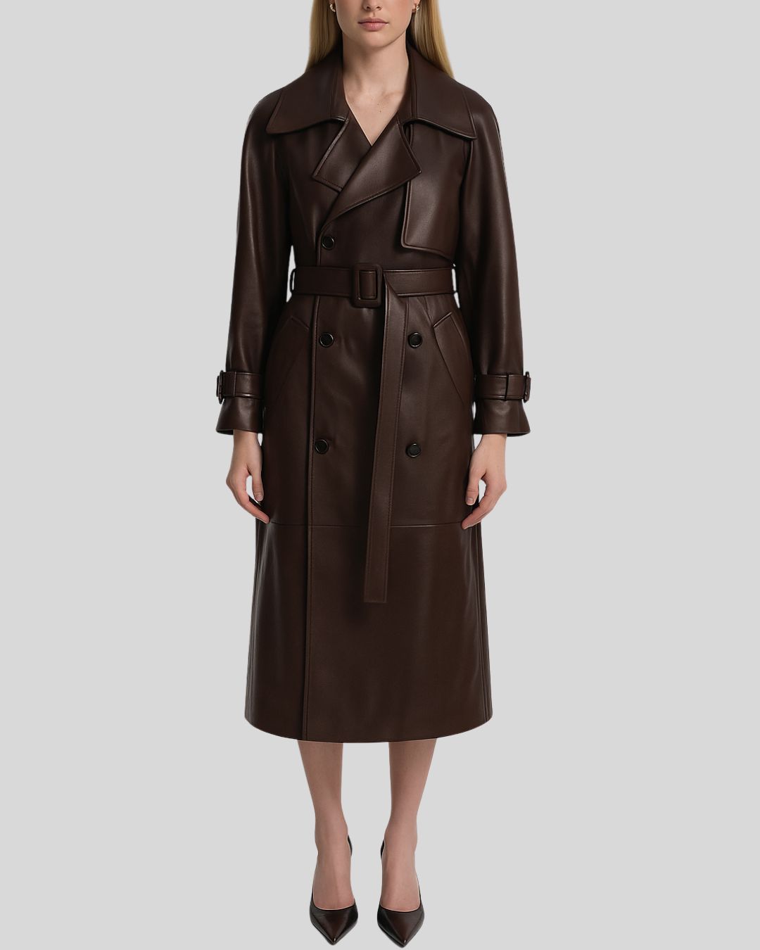 Front view of brown leather trench coat for women with belt and double-breasted closure
