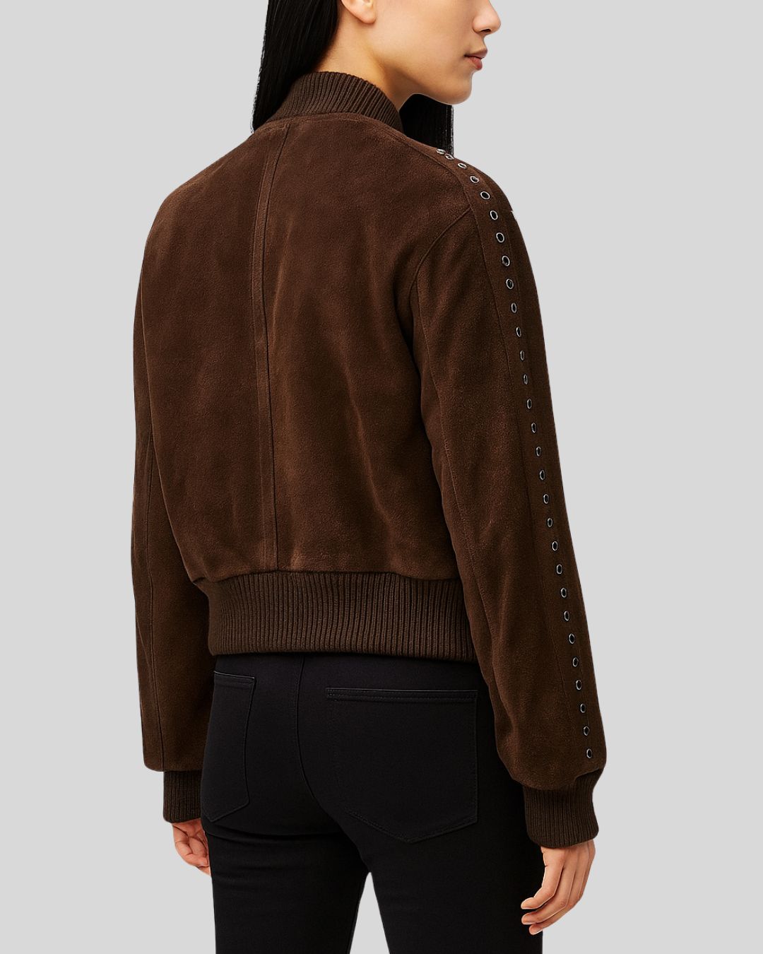 Back of dark brown suede bomber jacket with ribbed hem