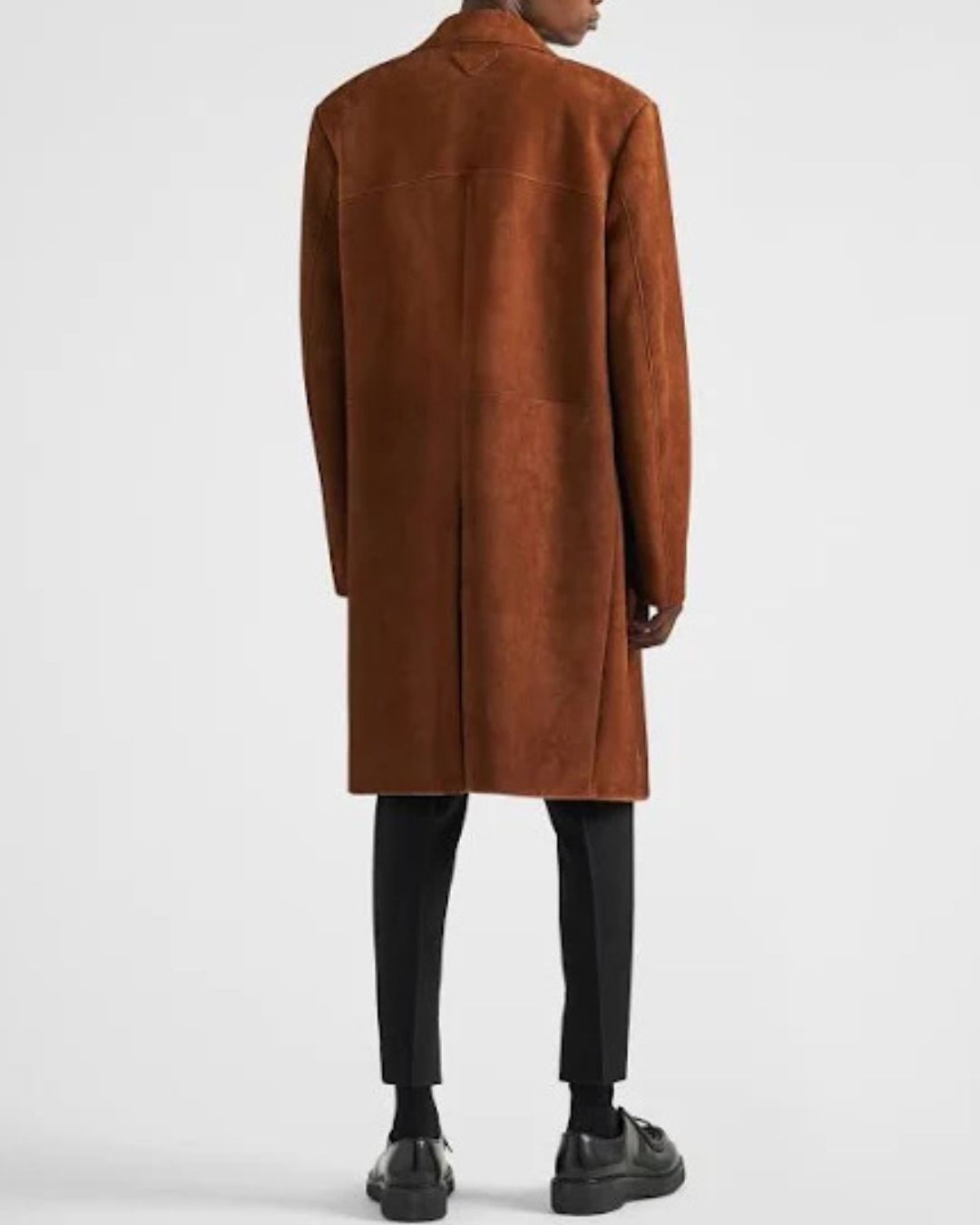 Rear view of brown suede overcoat on male model