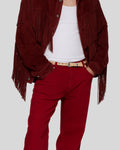 Burgundy fringe suede jacket styled with matching trousers and white tank
