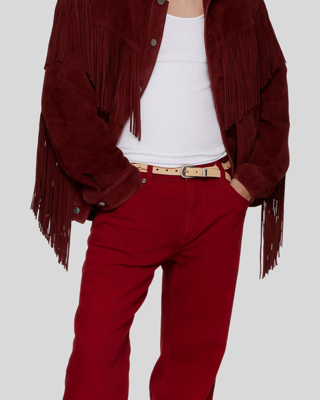 Burgundy fringe suede jacket styled with matching trousers and white tank