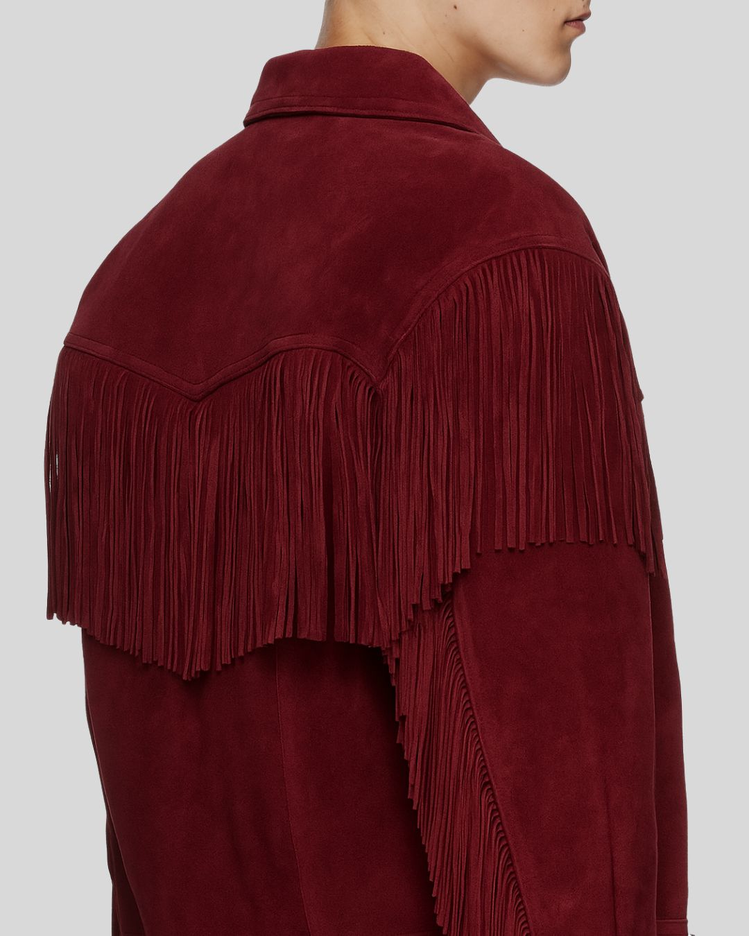 Man wearing burgundy suede fringe jacket – front view