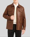 Close-up front of the brown leather utility jacket with flap pockets