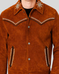 Close-up of suede jacket front details with studs on collar and pocket