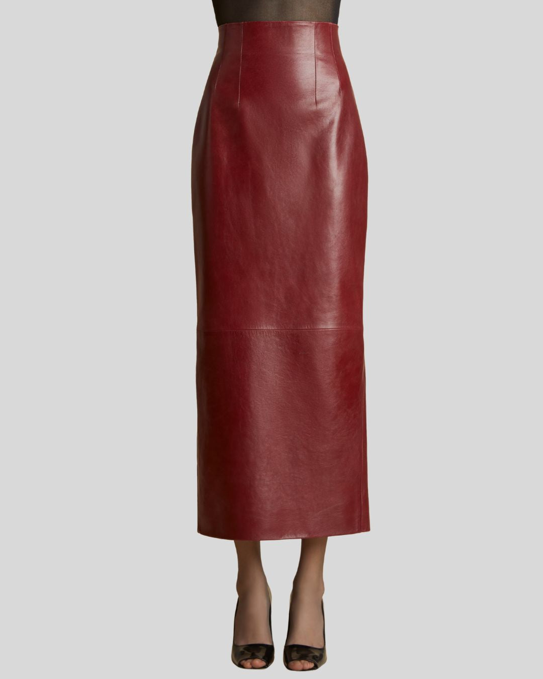 front profile of long burgundy leather skirt