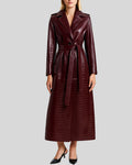 Front view of croc embossed burgundy leather trench coat with belt