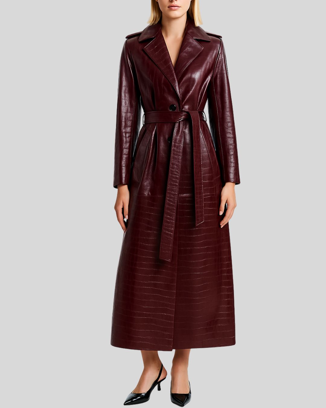 Front view of croc embossed burgundy leather trench coat with belt