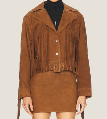 Brown suede jacket with fringes on a plain background