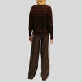 back view of Espresso Stride loose brown leather pants