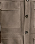 Utility pocket stitching close-up of suede vest