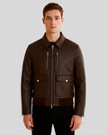 Dark brown leather bomber jacket front view on male model