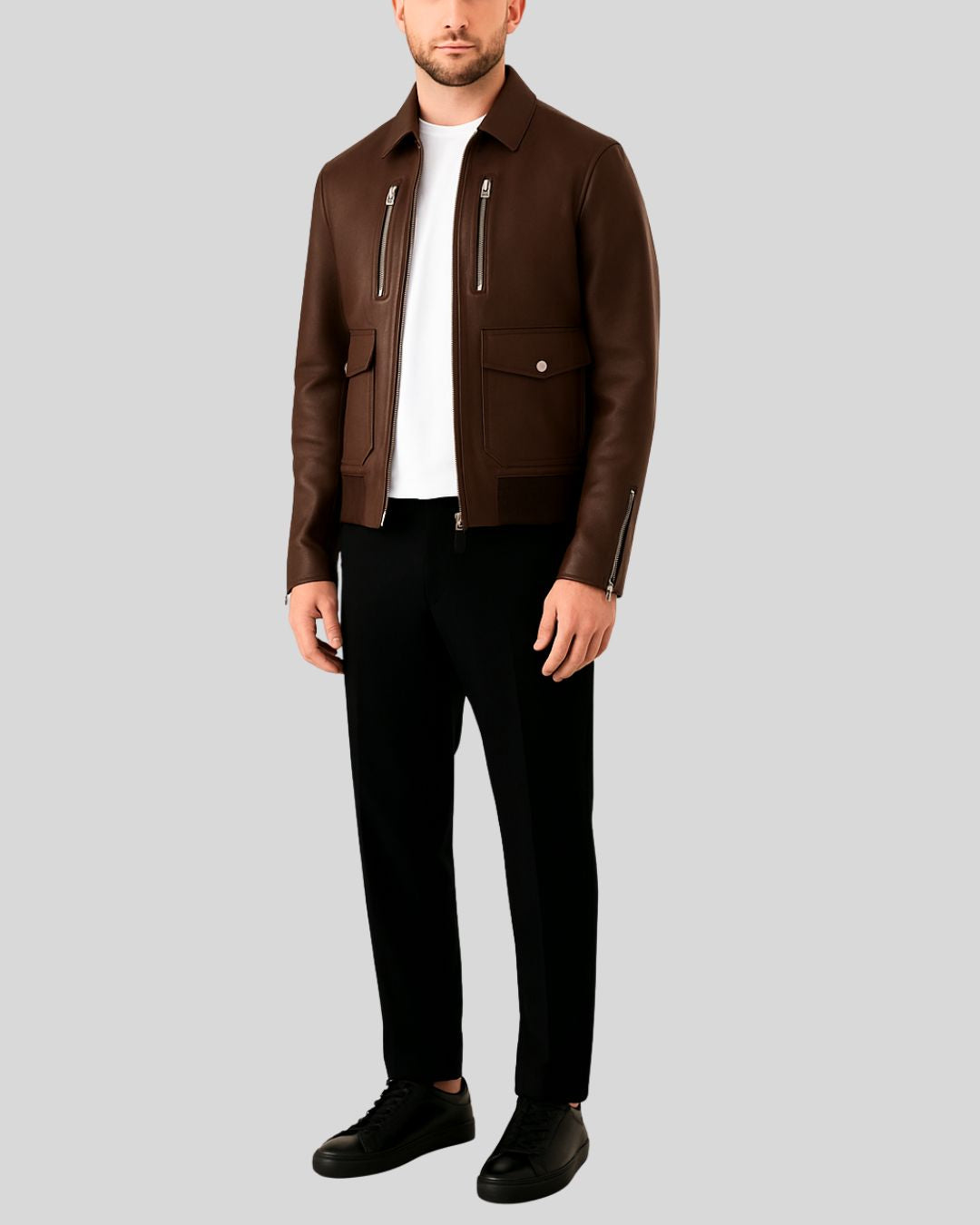 Dark brown leather bomber jacket front view on male model