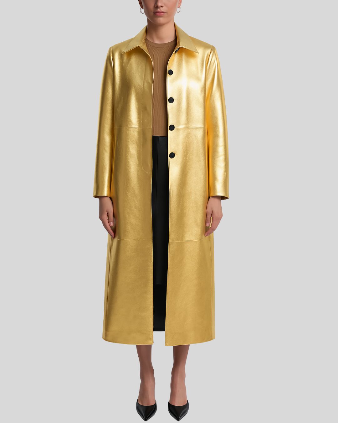 Alt Text: Gold metallic lambskin trench coat for women with open button closure